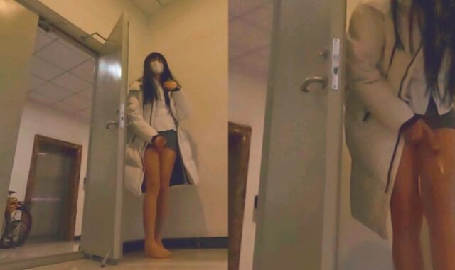 Chinese she-creature spunks in the corridor while listening to the sound of the elevator